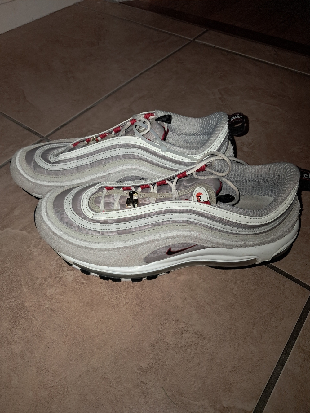 Nike Men's Airmax 97 Sneakers in Light Gray with Red Accents